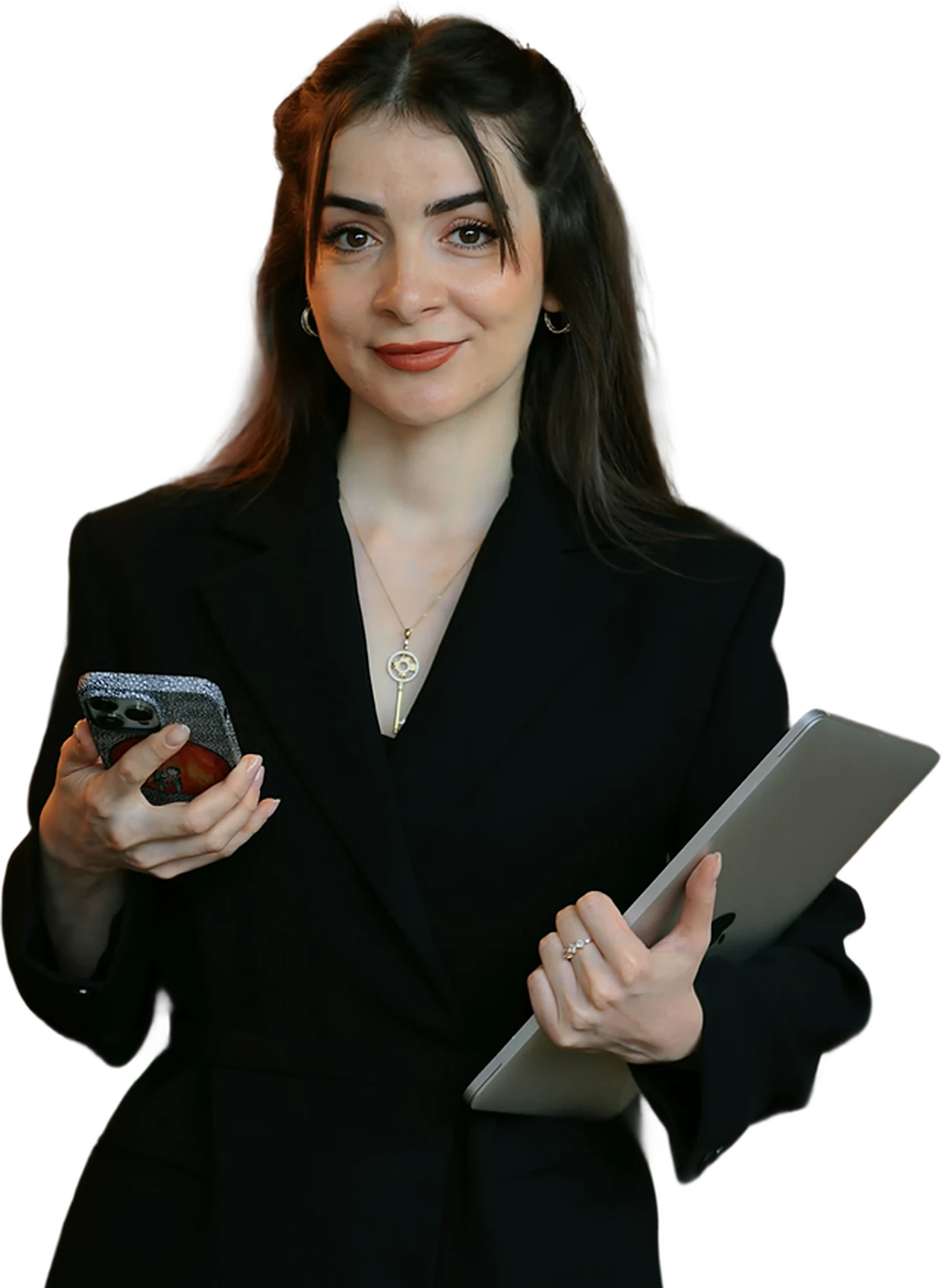 Professional woman holding a phone and laptop, representing security and technology.